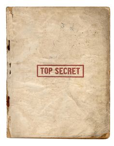 an old book with the words top secret on it