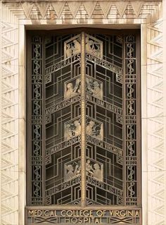 an art deco door is shown on the side of a building