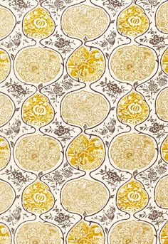 an orange and yellow pattern on white fabric