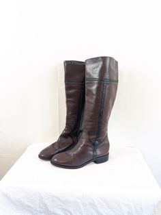 "Great boots! By Brighton  Size 7 M Made in Brazil Great vintage shape.  sole lenght: 9 7/8 sole width at widest: 3 1/2\" shaft: 16\" heel: 1\"" Vintage Boots With Leather Lining And Medium Width, Vintage Leather Boots With Wide Calf, Vintage Riding Boots For Fall, Vintage Wide Calf Leather Boots, Vintage Riding Boots, Vintage Leather Wide Calf Boots, Vintage Leather Riding Boots, Vintage Wide Calf Leather Mid-calf Boots, Vintage Wide Calf Knee-high Boots