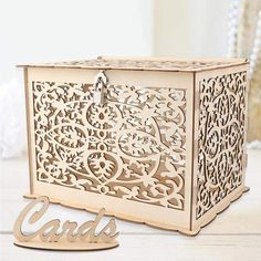 an ornate wooden box is shown with the word ourstrum in arabic writing on it