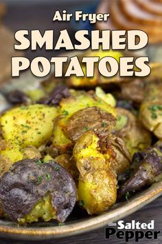 an air fryer smashed potatoes on a plate with the title, air fryer smashed potatoes