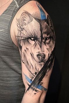 a man with a wolf tattoo on his arm