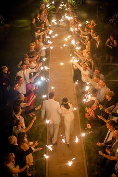 - https://howcandothis.com/weddingideas/61676/ Wedding Sparklers, Mod Wedding, Wedding Guide, Diy Wedding Decorations, Wedding Plans, Walking Down The Aisle, Simple Weddings, Backyard Wedding, Wedding Tips