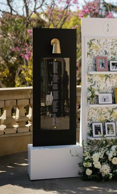 a display with flowers and pictures on it