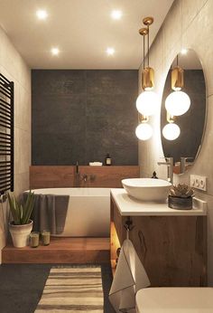 a bathroom with a sink, toilet and bathtub next to a mirror on the wall