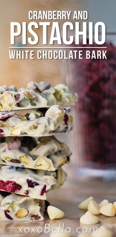 cranberry and pistachio white chocolate bark is stacked on top of each other