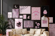 a living room filled with lots of pink and black art on the wall above a white couch