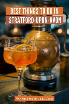 an orange drink sitting on top of a counter next to a glass vase with the words best things to do in stafford - upon