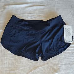 Navy Blue Color 2 5" Inseam Fully Lined New With Tags, Never Worn Navy Blue Lululemon Shorts, Navy Lululemon, Lululemon Hotty Shorts Blue, Navy Athletic Shorts With Built-in Shorts, Blue Lululemon Shorts, Lululemon Running Shorts, Light Grey Leggings, Athleta Shorts, Lululemon Speed Up Shorts