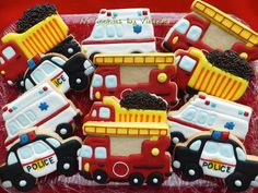 decorated cookies in the shape of firetrucks and trucks