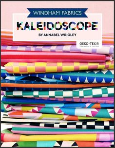 a stack of colorful fabrics with the words kaleidoscope written on it in white