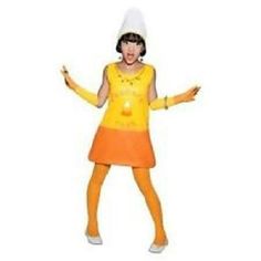 a woman dressed in an orange and yellow outfit with her hands out to the side