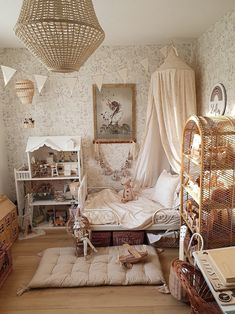 a child's bedroom with lots of furniture and decor