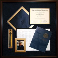 a framed diploma and other items are on display