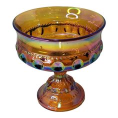 a shiny glass bowl with the number eight on it