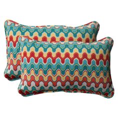 two colorful pillows on a white background