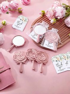 pink flowers and personal care items on a table