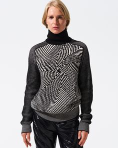 Introducing the Perfect Moment Wavy Star Roll Neck Sweater, a modern update to the iconic star design, crafted from luxurious Woolmark-certified Merino wool. Designed to lock in warmth while offering a stylish, relaxed fit, this turtleneck sweater is perfect for both on and off the slopes. The rib-knit details at the turtleneck, hem, and cuffs add extra comfort and structure, making it an ideal piece for elevating your ski-to-après wardrobe. Key Attributes: Relaxed Fit: Designed for a comfortable and flattering relaxed fit, this sweater is intended to hit at the hip, making it perfect for layering or wearing solo. Turtleneck for Added Warmth: The rib-knit turtleneck provides both warmth and style, ensuring you stay cozy in colder conditions. Rib-Knit Hem and Cuffs: The rib-knit hem and cuf Layered Long Sleeve, Roll Neck Jumpers, Roll Neck Sweater, Wool Turtleneck, Perfect Moment, Cargo Pant, Roll Neck, Summer Hats, Polished Look