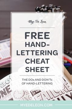 the free hand lettering sheet is on top of a desk