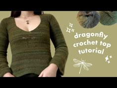 the woman is wearing a green sweater with dragonflys on it