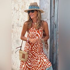 Bold Geometric Pattern For A Unique Style Statement. Comfortable And Flowy Fabric That Drapes Beautifully. Sleeveless Design To Keep You Cool On Hot Days Maxi Length For A Trendy And Elegant Look. This Maxi Dresses Are Perfect For Casual Outings, Beach Vacations, Or Summer Parties. Chic Orange Sleeveless Dress For Vacation, Chic Boho Print Sleeveless Sundress, Chic Sleeveless Boho Print Sundress, Orange Sleeveless Dress For Beach Vacation, Chic Orange Sleeveless Beach Dress, Orange Halter Neck Sleeveless Dress For Vacation, White Sleeveless Boho Print Maxi Dress, Bohemian Orange Sleeveless Beach Dress, Spring Beach Sleeveless Dress With Boho Print