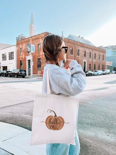 This cotton canvas bag is a versatile and durable accessory, perfect for everyday use. It’s ideal for carrying groceries, books, and other daily essentials. The sturdy canvas ensures longevity, allowing the bag to withstand years of regular use. Plus, being reusable and eco-friendly, it's a great alternative to single-use plastic bags, helping reduce waste and environmental impact. The handles, crafted from the same durable fabric, offer comfort and ease, even when carrying heavier loads, making it as practical as it is sustainable.
100% cotton canvas
Heavyweight fabric (12 oz/yd², 406.9 g/m²)
Sewn-in label for added quality"
15’’ x 16’’ inch 
20’’ inch handles 
-PLEASE NOTE-
Colors in the mockups may appear slightly different from the final product. 
-SHIPPING-
We offer FREE SHIPPING. Est