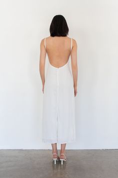 Meet the Demi dress, a 90’s inspired silhouette. Fits close to the body with a square neckline and exposed back. White - 100% Rayon Dry Clean only. Fully lined. Cris is 5'9 / 175 cm and wearing a size 1 which is equivalent to a size Small. Square Necklines, Square Neckline, Timeless Pieces, White Dress, Dry Clean, Wardrobe, Square, How To Wear, White