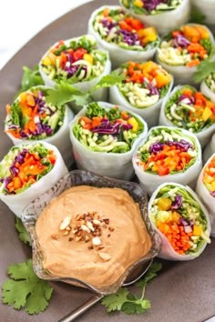 a platter filled with lots of different types of food on top of each other