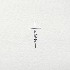 the word faith written in cursive ink on white paper