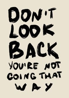 the words don't look back you're not going that way are written in black ink