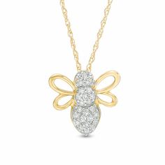 With sparkle and whimsy, this diamond bee pendant will dazzle and delight. Crafted in warm 10K gold, this charming style features a diamond-lined body and polished wing outlines. Radiant with 1/10 ct. t.w. of diamonds and a brilliant buffed luster, this design suspends along an 18.0-inch rope chain that secures with a spring-ring clasp. Bee Jewelry, Bee Pendant, Round Moissanite, Diamond Stone, 10k Gold, Spring Rings, Necklace Designs, Gold Finish, Colored Diamonds