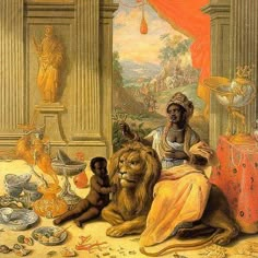 a woman sitting on the floor next to a lion and other items in front of her