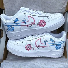 authentic white Nike Air Force 1 hand painted custom sneakers pink/blue roses on the outsides of the sneakers All sneakers are made on order, please allow the indicated time for your item to be shipped. If you have any questions about the process time or do you need the sneakers quickly? Just send us a message!   * Be aware of your sneaker size, please in doubt go to the store first * Sneakers color may vary slightly due to photographic lighting and sources of your screen settings * All our snea Luxury Custom Sneakers For Women - Spring, Cute Nike Air Force 1 Custom For Teens, Luxury White Custom Sneakers For Spring, Nike Air Force 1 Flowers, Disney Air Force 1 Elsa Frozen, White Nike Air Force 1, White Nike Air Force, Nike Air Force 1 Custom, White Nike Air