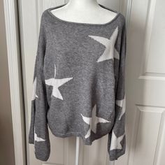 Grey & White Star Sweater With Oversized Sleeves. 24” Pit To Pit. Only Worn Once, Brand New Condition. See Pictures For Material Content. White Crew Neck Sweater With Star Print, Star Printed Sweater, White Star Print Winter Sweater, Casual Black Star Print Sweater, Oversized Star Print Sweater, Star Sweater, Colorful Sweaters, Grey And White, Sweaters For Women