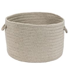 a large round basket with handles on the bottom and roped ends, made from jute