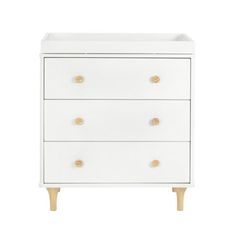 a white dresser with three drawers and two wooden handles on the bottom, against a white background