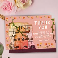 a thank card with an image of a dog in a cage and flowers on the table