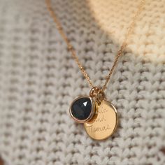 Symbolising strength and support, our semi-precious black onyx gemstone is paired with our signature disc charm, and hand-engraved to create a personalized necklace as unique as you are.Please note that there may be slight variations between each birthstone and gemstone due to its origins.18K Champagne Gold Plated, 925 Sterling Silver or 18K Rose Gold PlatedDisc Charm: 0.7 x 0.7Gemstone: 0.5 x 0.5Secure clasp fasteningCharms are removable from this chain and can be worn on all Merci Maman chain Affordable Personalized Black Charm Necklaces, Affordable Personalized Black Jewelry, Cheap Personalized Black Charm Necklaces, Personalised Necklace, Gold Charm Necklace, Onyx Gemstone, Champagne Gold, Personalized Necklace, Gold Charm