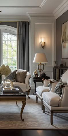 a living room filled with furniture and a large window covered in curtains next to a fireplace