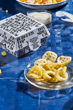 a box of cereal sitting on top of a blue table