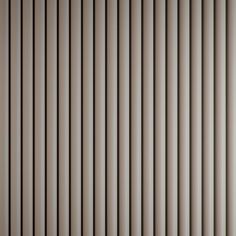 an image of vertical blinds that are very close to the wall in this room or office