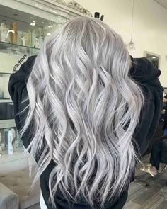 28 Ways to Get The Icy Blonde Hair Trend in 2023 Platinum Silver Hair Highlights Icy Blonde, Silver And Blonde Hair, Icy Grey Hair, Icy Blonde Hair With Lowlights, Blonde Hair 2023 Trends, Ice Blonde Hair With Lowlights, Icy White Hair, Icy Ash Blonde Hair, Icy Blonde Highlights On Dark Hair