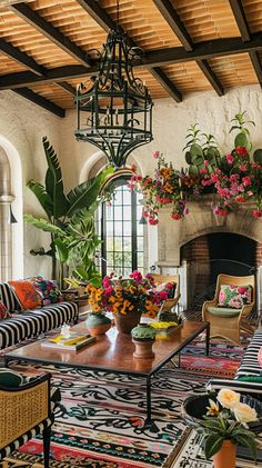 a living room filled with lots of furniture and flowers