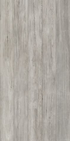 a wood paneled wall with grey paint