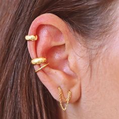 No piercing, no worries!  For an edgy, different look. Simply put your ear cuffs on (stacked or alone) and head out.  It is as simple as that.  Details * All components come in one of your choices: sterling silver rose gold vermeil, or gold vermeil (rose or gold plated over sterling silver). * Cuff thickness: 4mm. * Cuff diameter: 10mm * Comes beautifully packaged, in our branded Tiny Jewelry Box. Perfect for gift-giving, OR treat yourself!  For more designs, please browse my store here https:// Trendy Hypoallergenic Ear Cuff For Everyday Wear, Trendy Small Hoop Single Ear Cuff, Trendy Hypoallergenic Ear Climbers For Everyday, Trendy Everyday Hypoallergenic Ear Climbers, Trendy Pierced Ear Cuff For Everyday, Trendy Adjustable Pierced Ear Climbers, Trendy Hoop Ear Cuff For Pierced Ears, Trendy Huggie Ear Cuff For Pierced Ears, Adjustable Trendy Ear Climbers