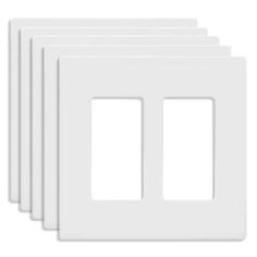 five white wall plates on a white background