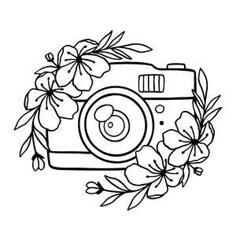 a camera with flowers and leaves around it