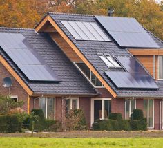 two houses with solar panels on the roof