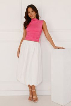 Length from waist to hem of size S: 72cm. Midi skirt. Lined. Model is a standard XS and is wearing size XS. True to size. Non-stretch. Elastic waist. Bubble hem. Slip on. Cold hand wash only. Cotton/Polyester. For lovers of the trending bubble skirt! Be seen wearing the Get The Look Bubble Midi Skirt. Featuring a high-rise fit with an elastic waistband and a voluminous design. Style with a crop top and heels. White Bubble Skirt, Homecoming Romper, Party Rompers, High Neck Designs, Knit Outerwear, Bubble Skirt, Dresses Backless, White Skirts, Get The Look